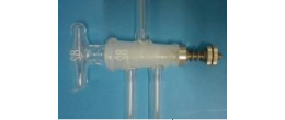 Rubinetto in vetro soffiato per alto vuoto a 2 vie con molla di ritegno NS 18,8 foro 4 mm.